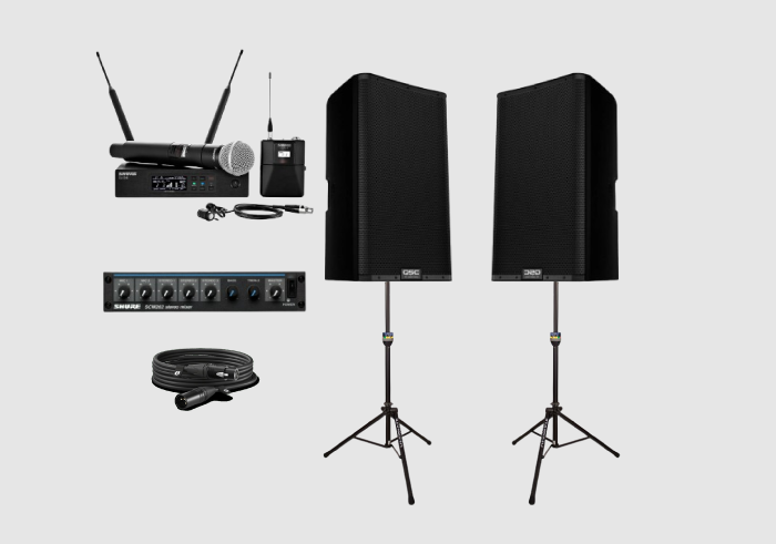 PA system with speakers, wireless microphone and audio mixer for rental.